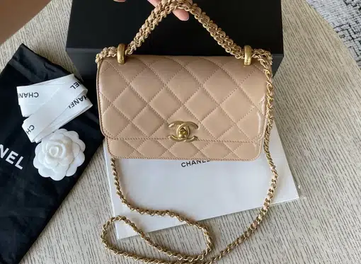 chanel bag with chanel written on strap