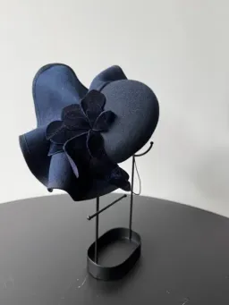 Felted Wool Headpiece with Sculptural Detail and Floral Velvet Adornment Navy One Size for rent on The Volte - image 2