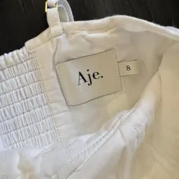 Aje white corset mini dress  for rent on The Volte - image 4