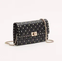 Valentino Rockstud Clutch for rent on The Volte - image 1