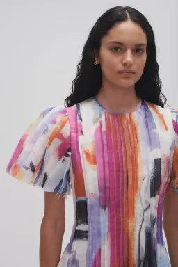 Aje Nova Pleated Midi Dress in Abstract Sunset Size 6 for rent on The Volte - image 2