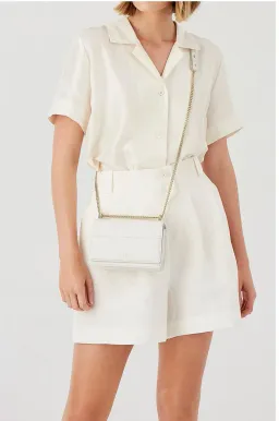 Oroton Forte Micro Clutch in Cream for rent on The Volte - image 3