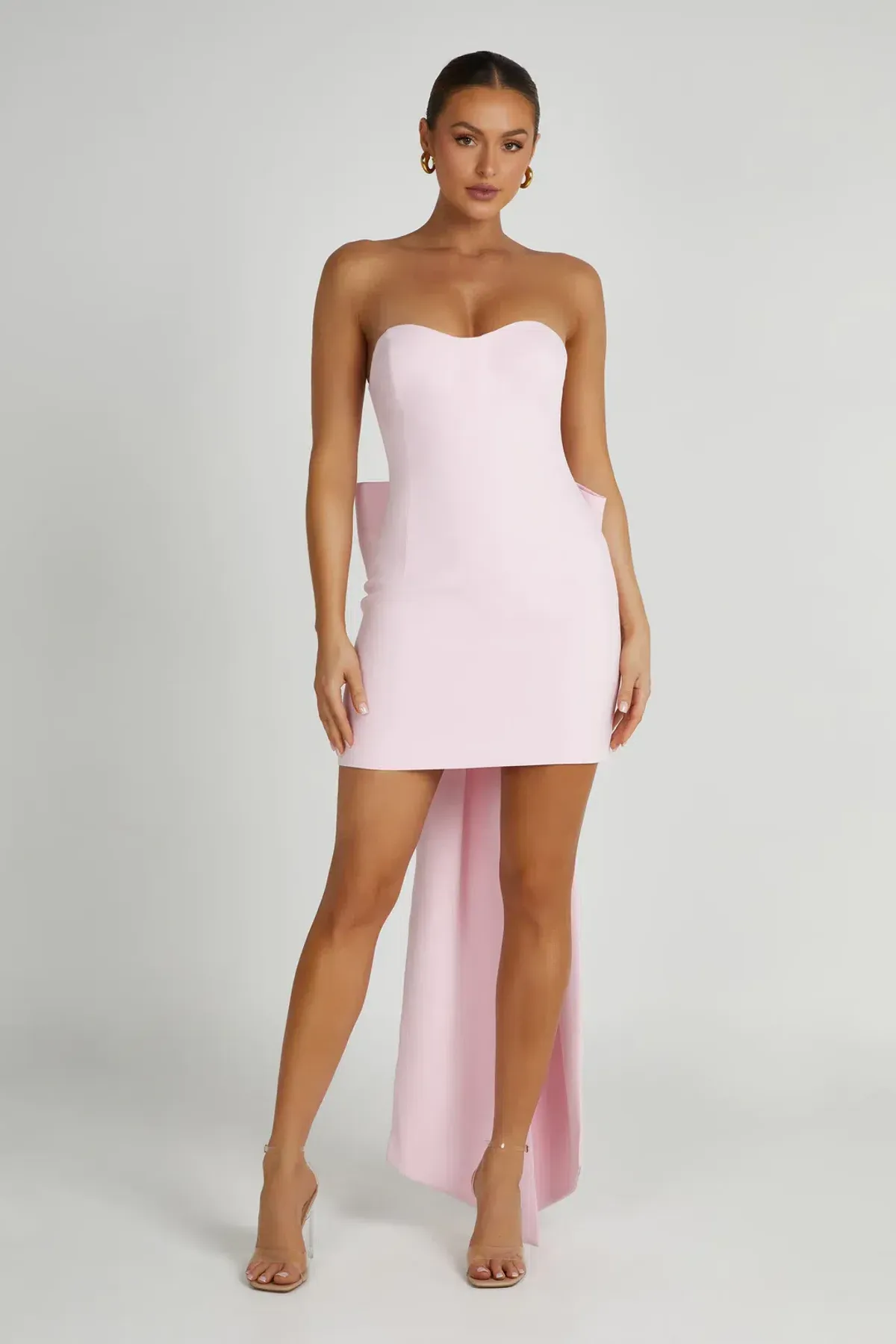 Meshki Meredith Strapless Bow Mini Dress in Blush Pink Size XS / AU 6 for rent on The Volte - main image