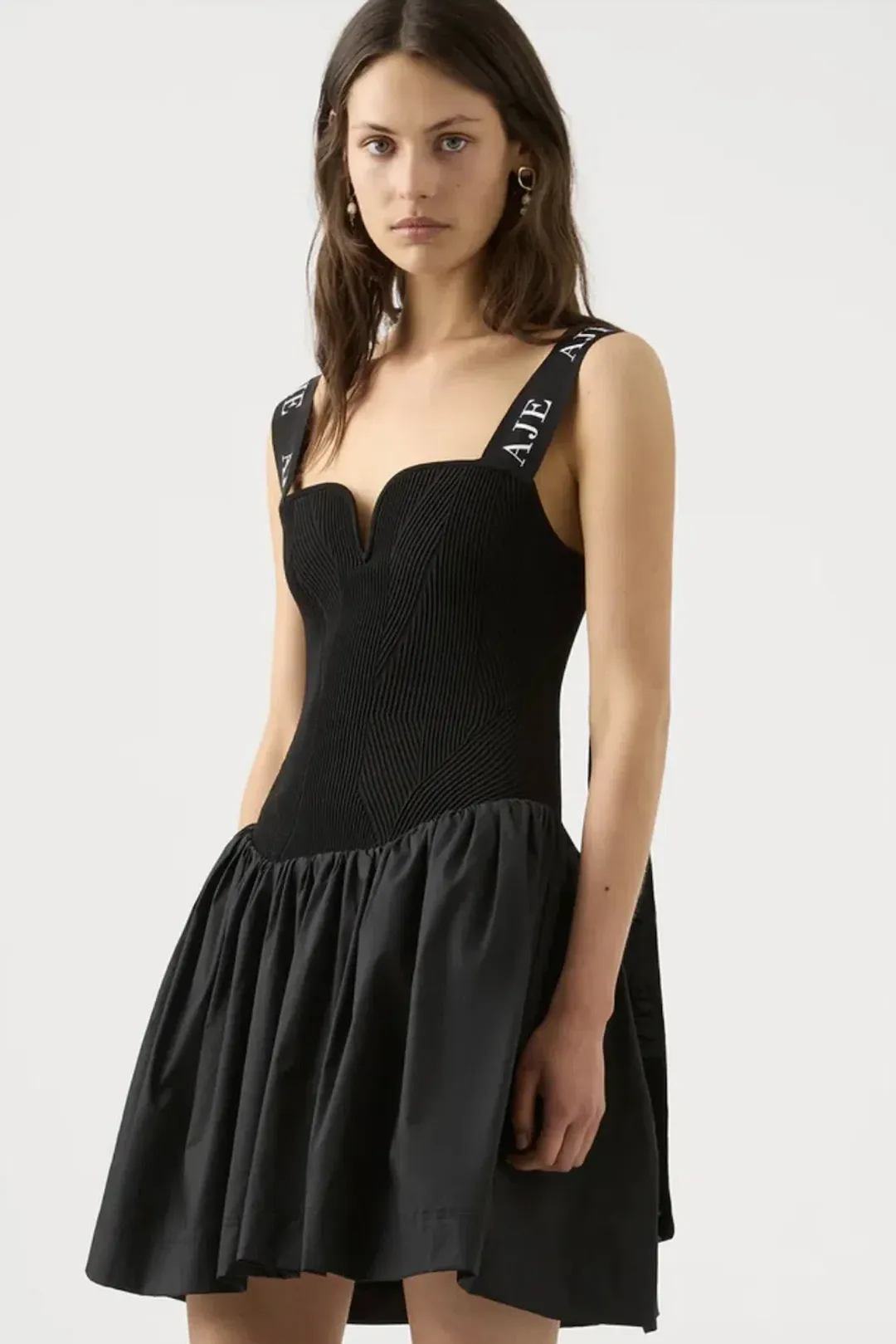 Aje Mira Logo Strap Tulip Mini Dress in Black - Size S for rent on The Volte - main image