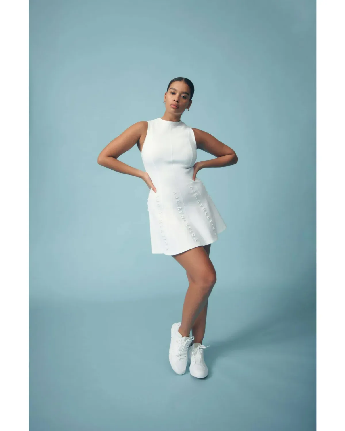 Aje signature logo dress in Ivory Size AU 8 for rent on The Volte - main image