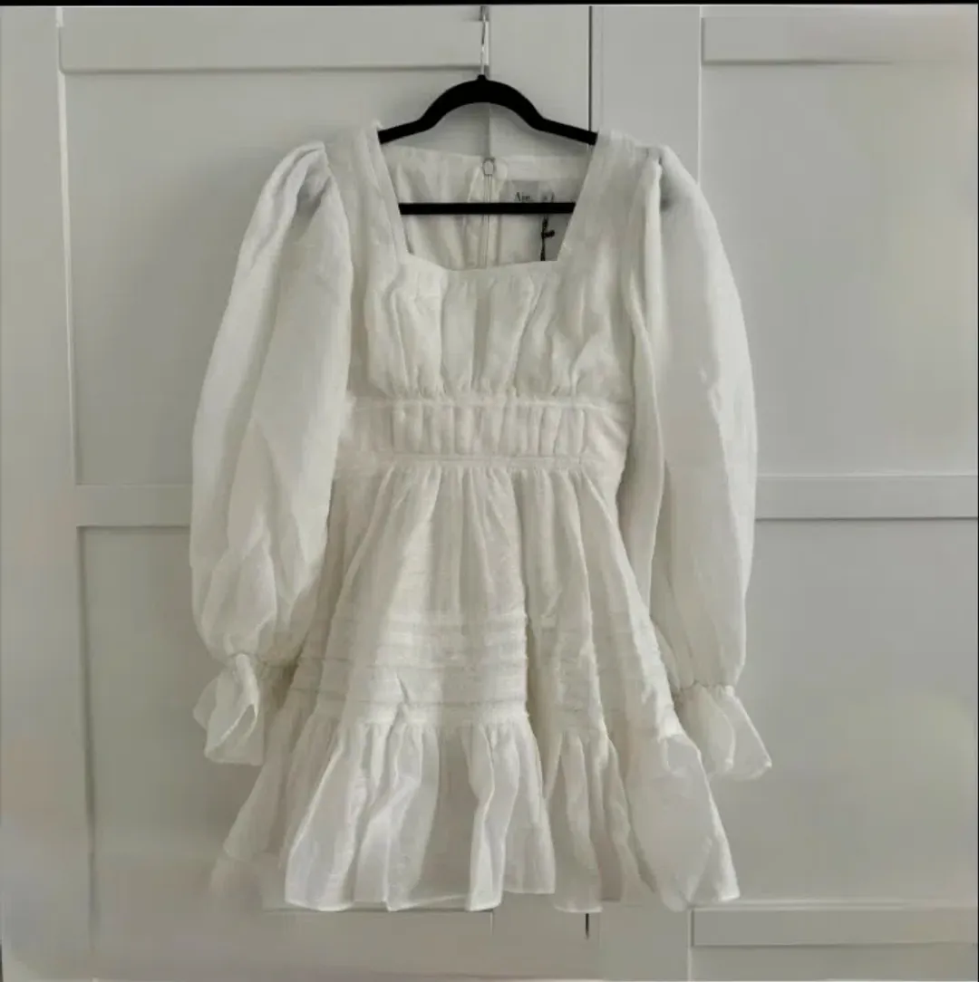 Aje Impression Mini Dress Ivory Size AU 8  for rent on The Volte - main image