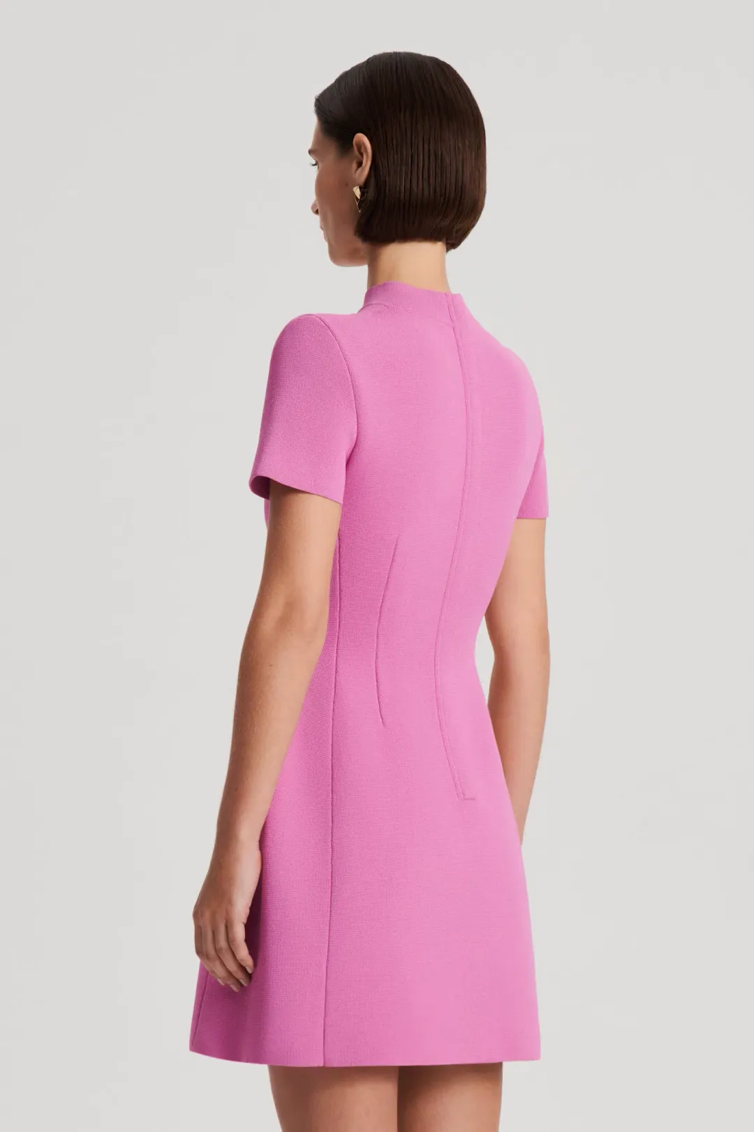 Scanlan Theodore Crepe Knit Peplum Mini Dress Peony Size XS / AU 6 for rent on The Volte - main image