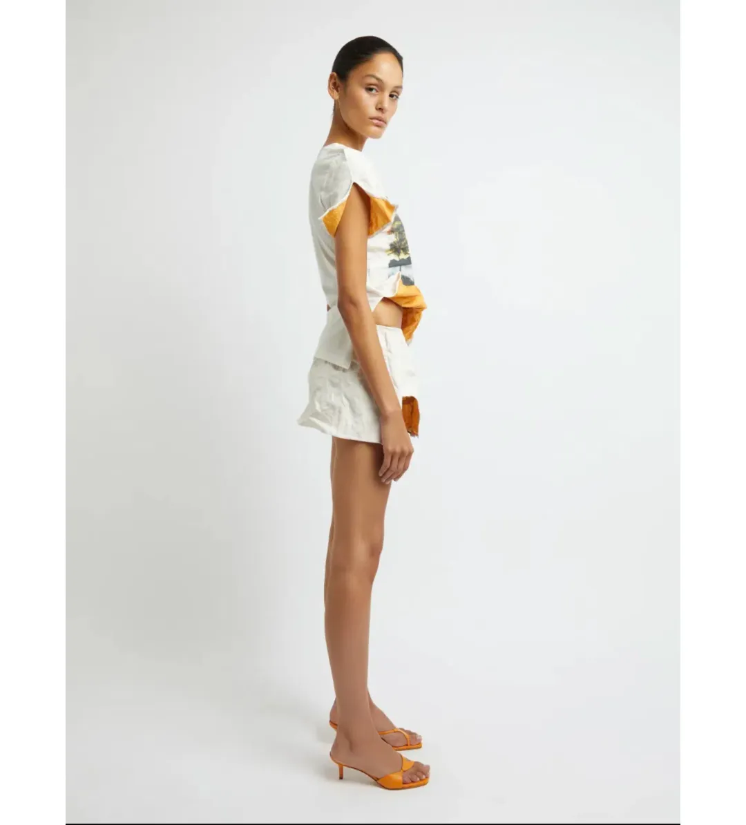 Christopher Esber Lost Souvenir Crushed Graphic Tee and Micro Skirt Size AU 8 for rent on The Volte - main image