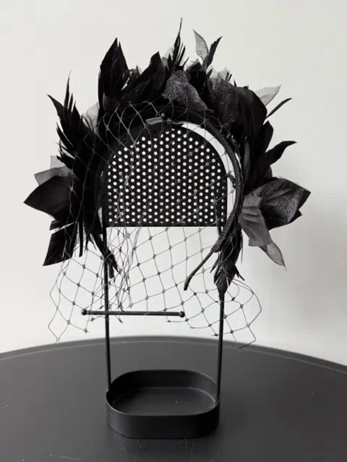 Olga Berg Fascinator Black for rent on The Volte - main image