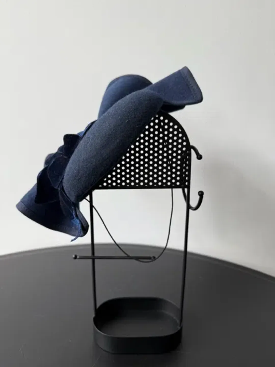 Felted Wool Headpiece with Sculptural Detail and Floral Velvet Adornment Navy One Size for rent on The Volte - main image