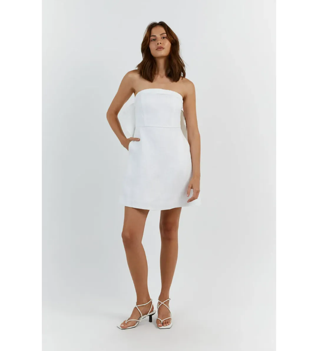Dissh Aisle Linen Back Bow Mini Dress White Size AU 10 for rent on The Volte - main image