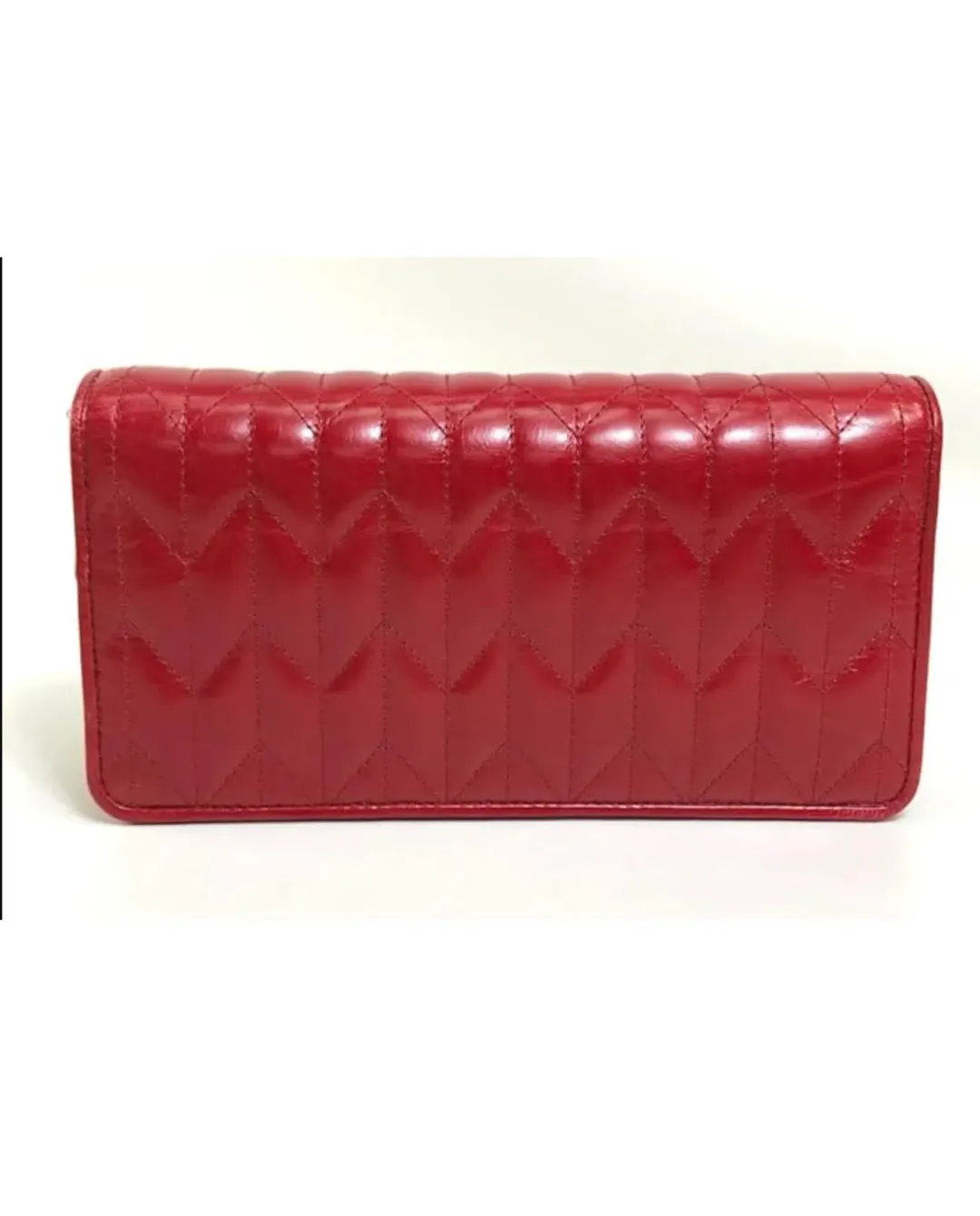 Miu Miu Matelasse Flap Clutch with removable strap Red for rent on The Volte - main image