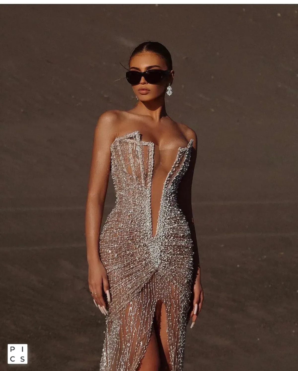 Albina Dyla Pearl Beaded Deep V Gown for rent on The Volte - main image
