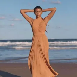 Scanlan Theodore Orange Crepe Knit Pleated Dress Size 10 for rent on The Volte - image 1