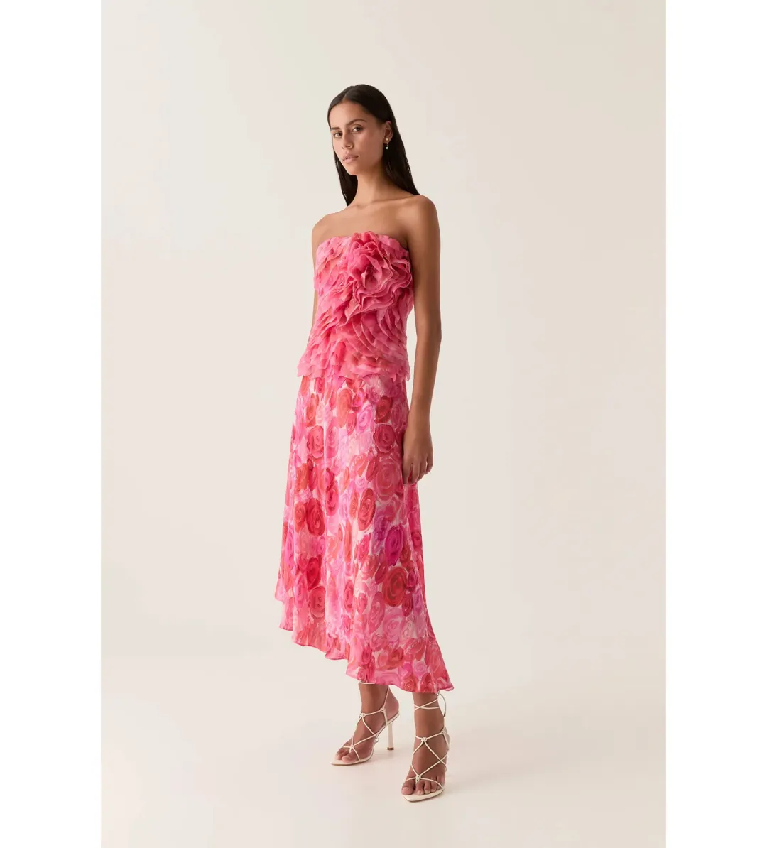 Aje Charmed Rosette Ruffle Bustier with Valeria Asymmetrical Midi Skirt in Misty Rose Size 6 for rent on The Volte - main image
