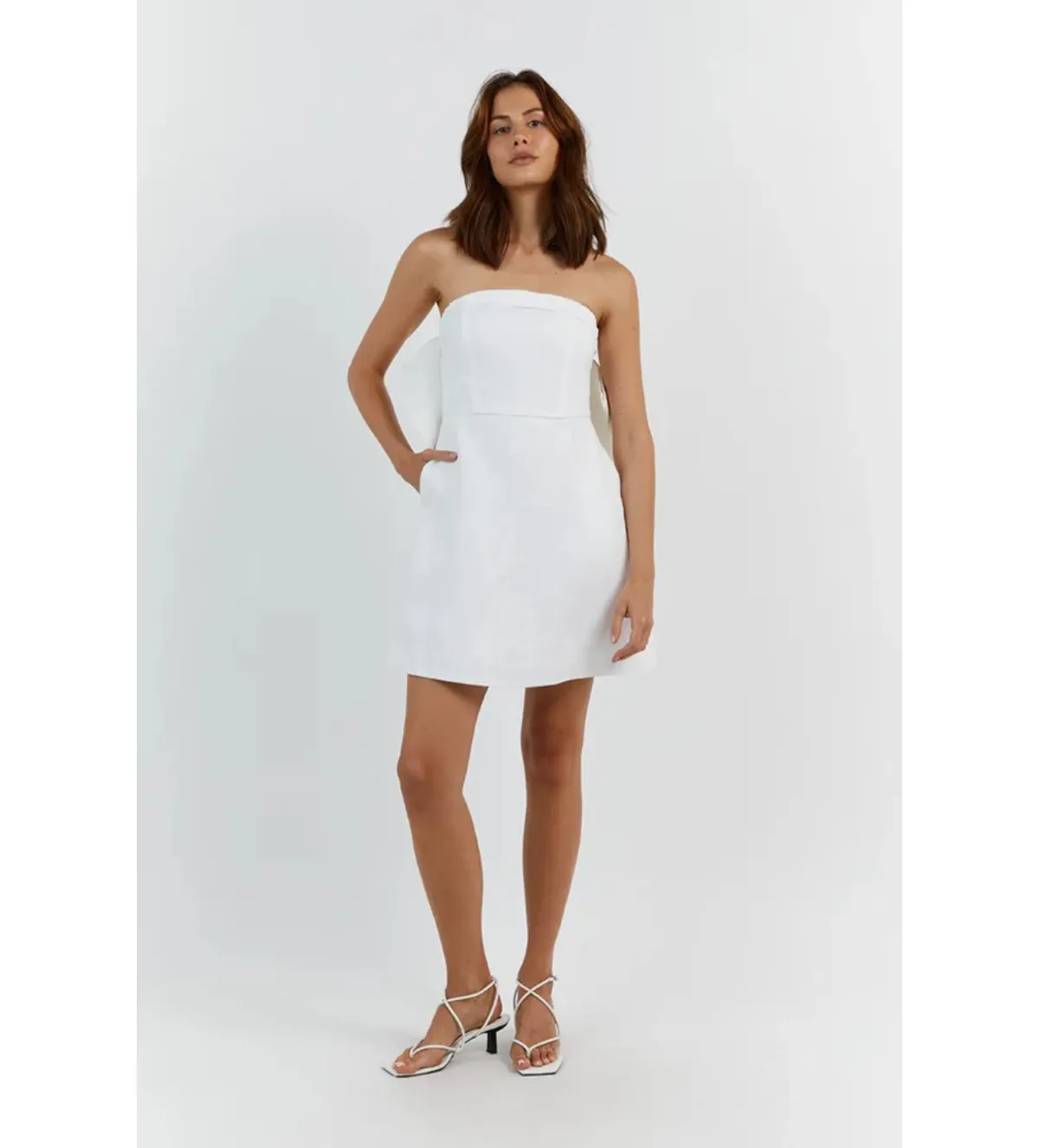 DISSH Aisle Linen Back Bow Mini Dress White Size AU 12 for rent on The Volte - main image