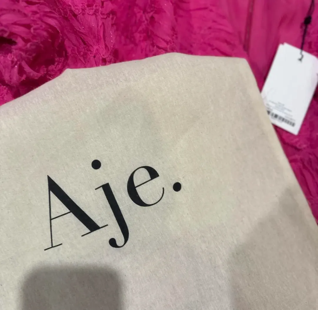 Aje Florential Mini Swing Dress in Azalea Pink Size 16 for rent on The Volte - main image