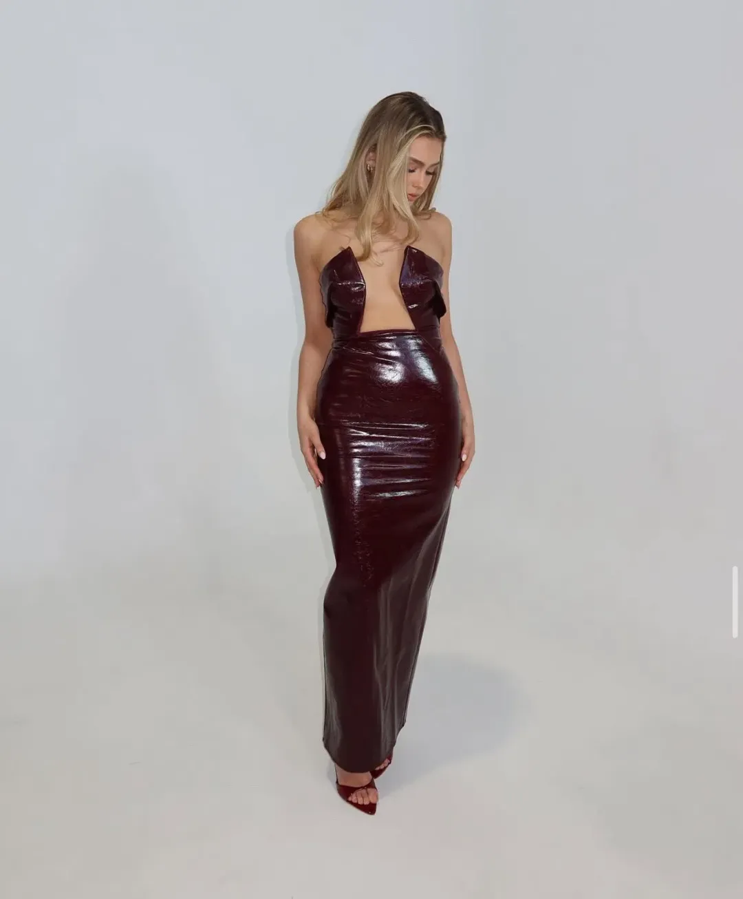 She is OLLÁ Sole Maxi Dress in Burgundy Size XS / AU 6  for rent on The Volte - main image