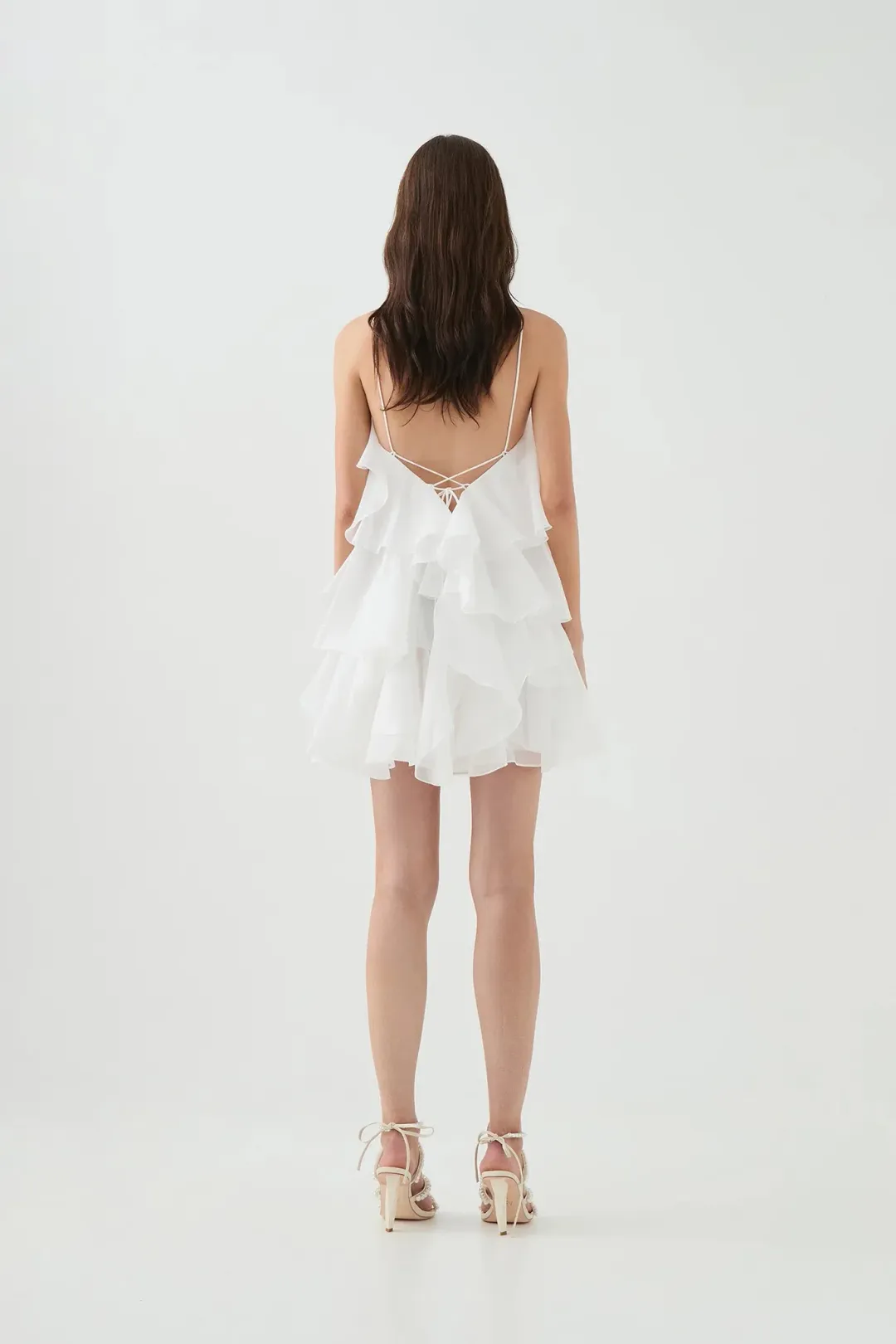 Aje Pandorea Layered Mini Dress in Ivory Size AU8 for rent on The Volte - main image