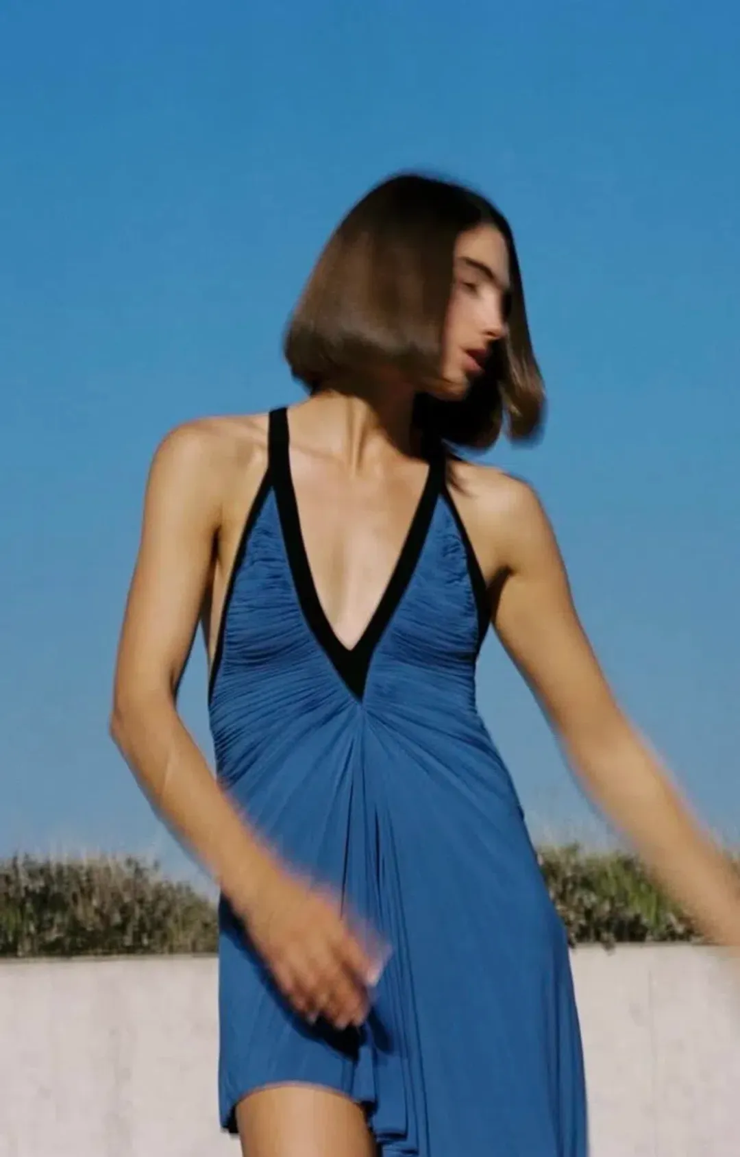 Christopher Esber V-neck Suspended Jersey Fluted Mini Dress Blue Iris Size 6 for rent on The Volte - main image