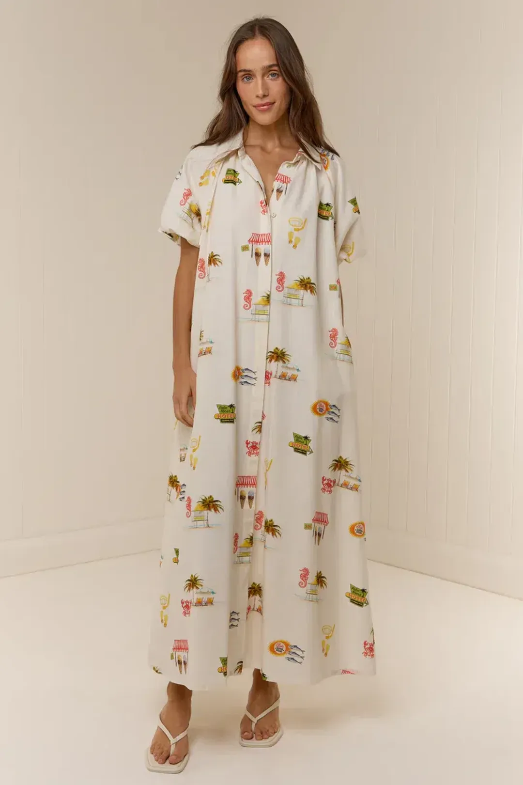 The Marla Dress - Palm Noosa.  Size 10, Midi length. for rent on The Volte - main image