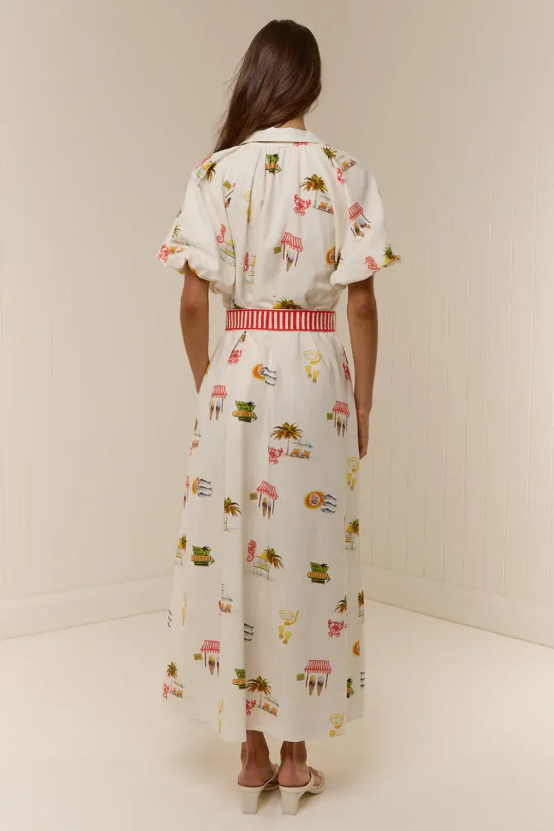 The Marla Dress - Palm Noosa.  Size 10, Midi length. for rent on The Volte - main image