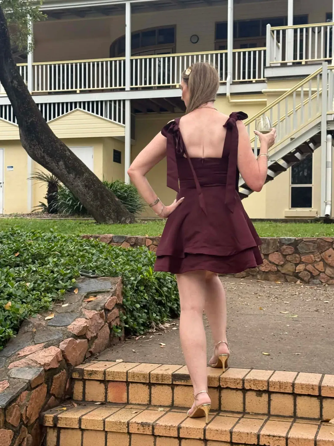 Elliatt Livia tiered mini dress burgundy size S for rent on The Volte - main image