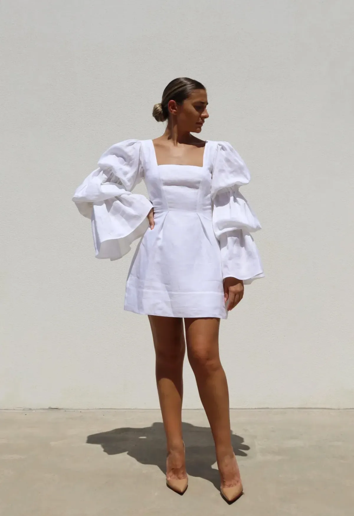 Isabella Longginou White Puff Mini Dress for rent on The Volte - main image