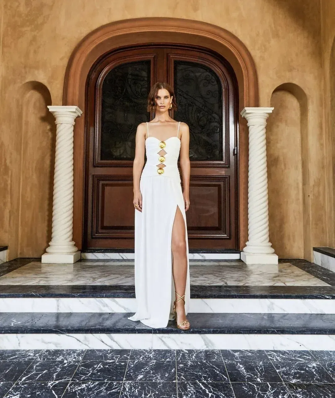 🤍BRAND NEW - REBECCA VALLANCE Guinevere Strap Gown- Size 12 – Ivory White Maxi Dress with Gold detail🤍 for rent on The Volte - main image