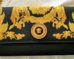 Versace classic Barocco print wallet on chain/crossbody clutch bag for rent on The Volte - image 1