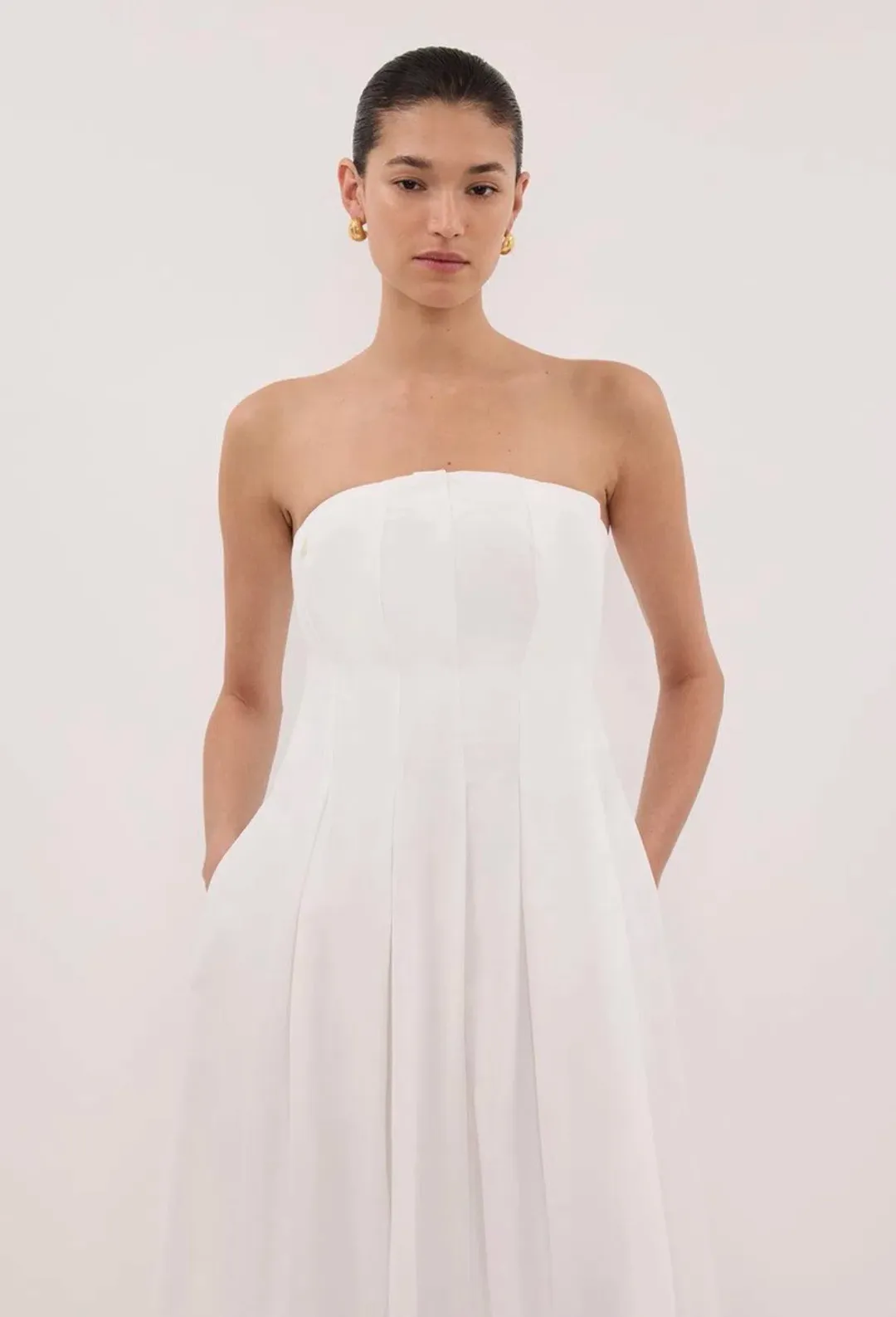 Beautiful DISSH Lilly White Cotton Strapless Midi Dress in size 10. for rent on The Volte - main image