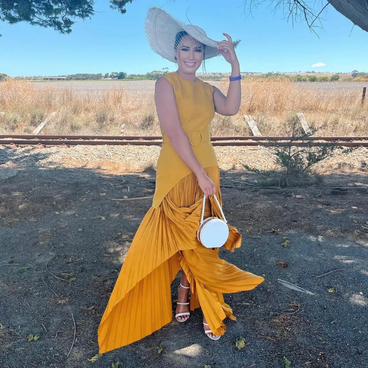 Solace London Belted Crepe-panelled Plissé Satin Maxi Dress Yellow Size 12 for rent on The Volte - main image