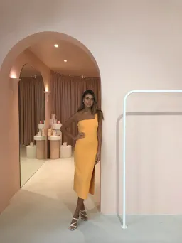 Bec & Bridge Ariel Midi Dress in Mango Orange Size 12 for rent on The Volte - image 4