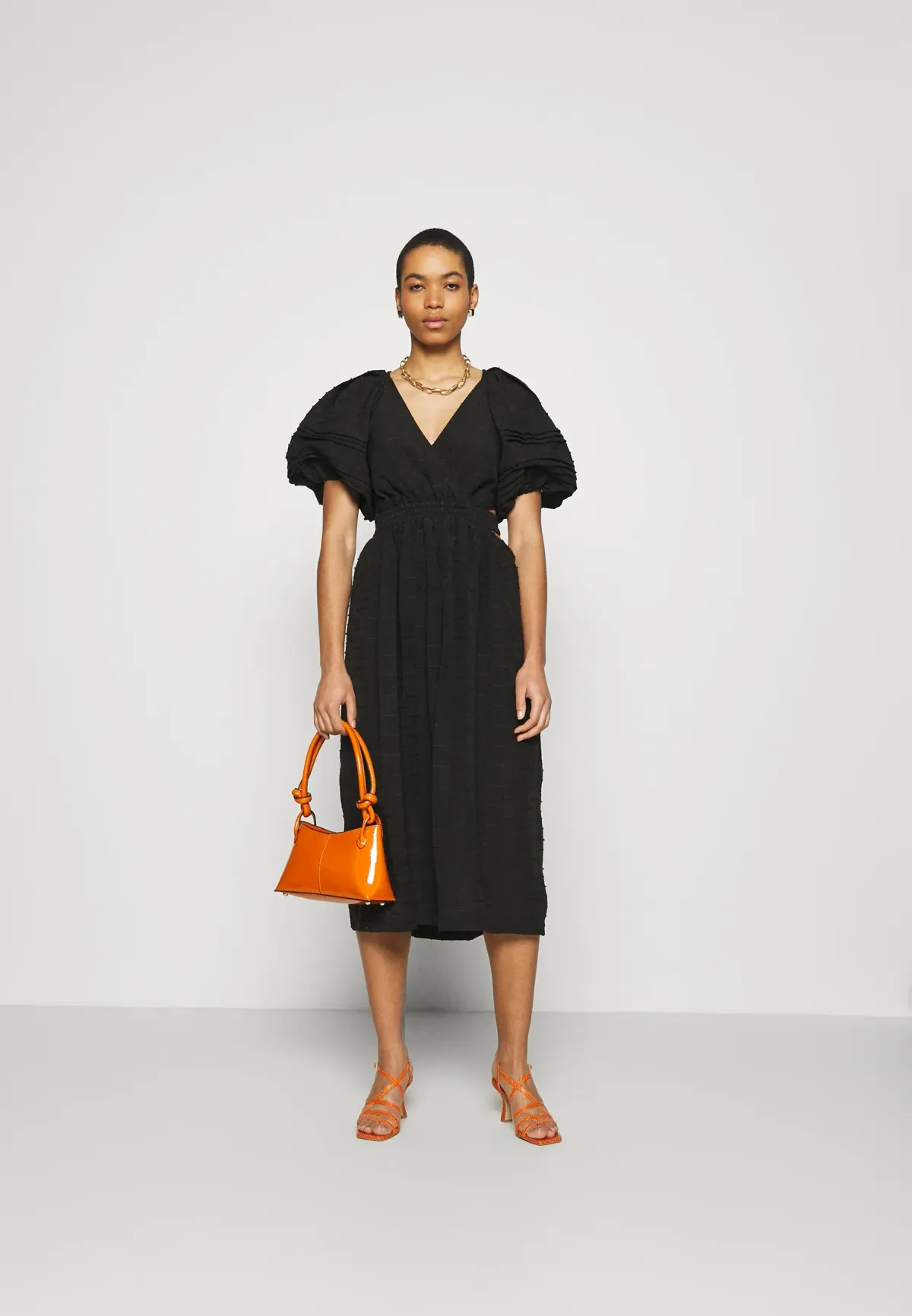 C/MEO Disperse Short Sleeve Dress Black Size 6 for rent on The Volte - main image