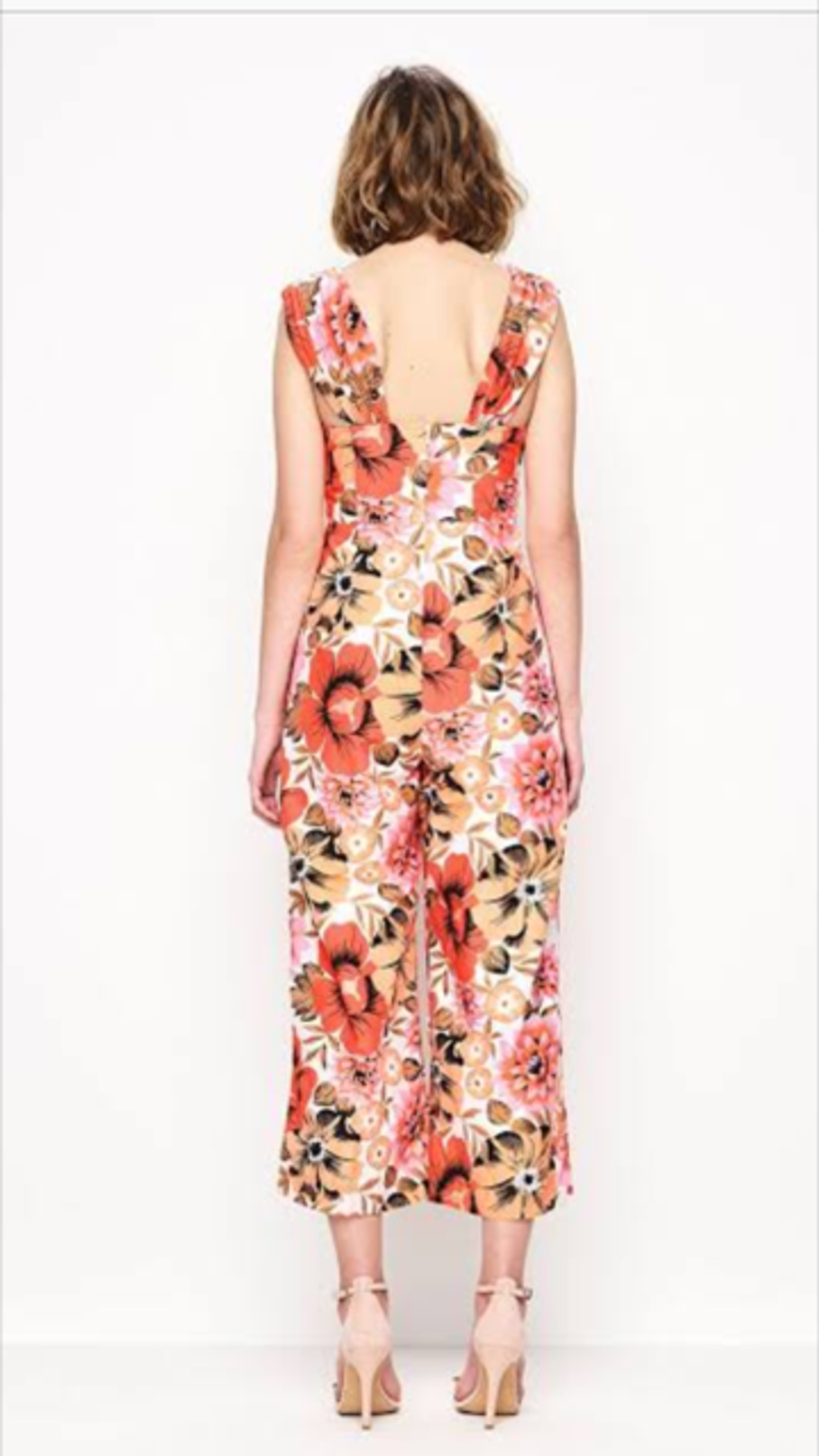Alice McCall Stop and Stare Orange Floral Jumpsuit Size 4 for rent on The Volte - main image
