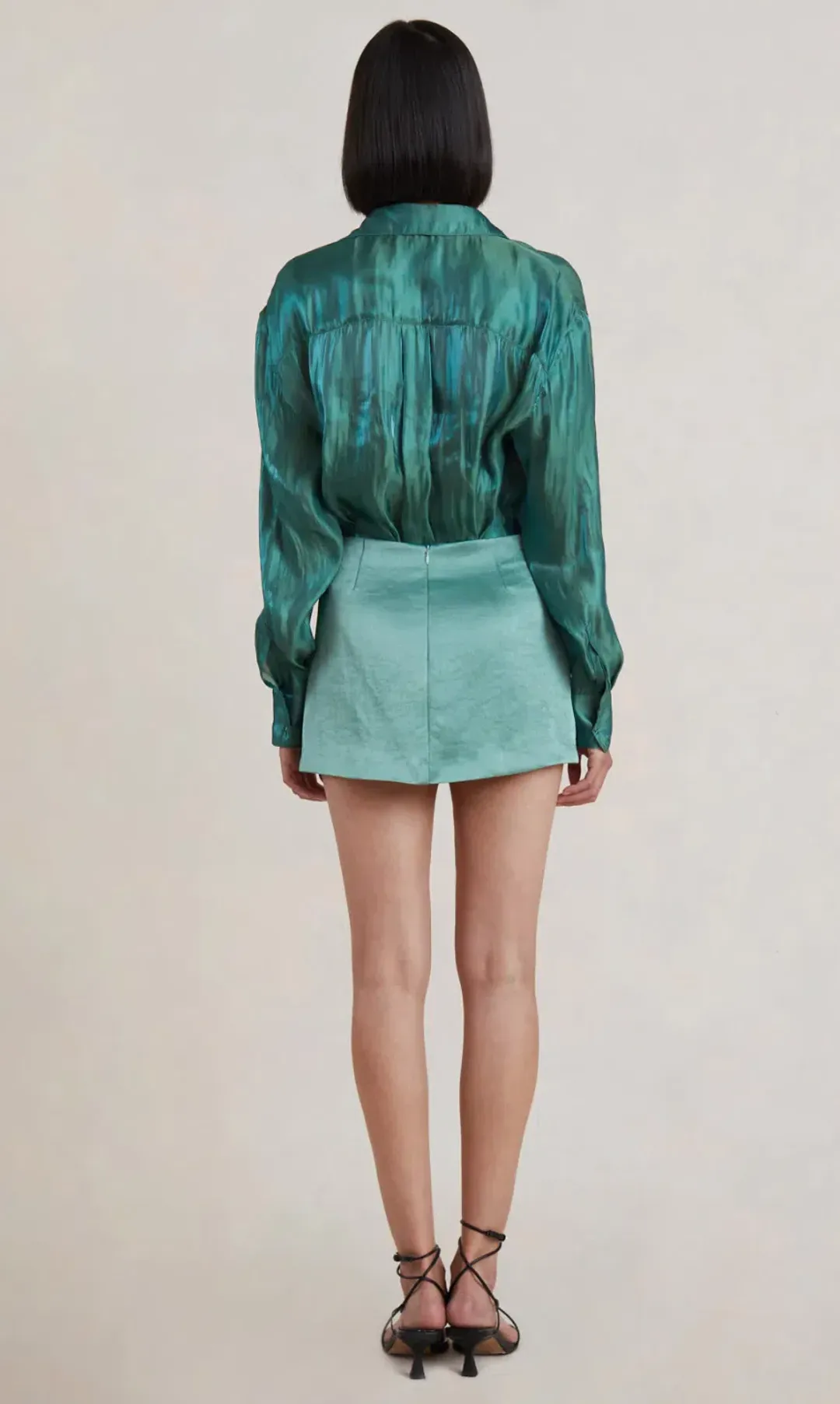 Bec & Bridge Symone Mini Skirt Moss Green Size AU 8 for rent on The Volte - main image