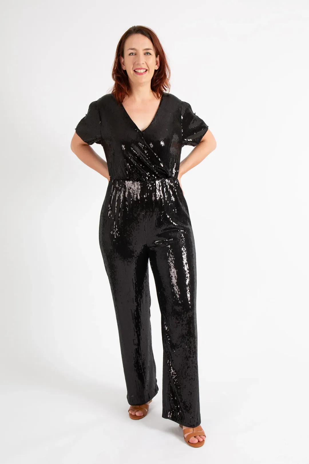 Hugo Boss Stretch Jersey Sequin Jumpsuit with Fixed Wrap Front Black Size AU 10 for rent on The Volte - main image