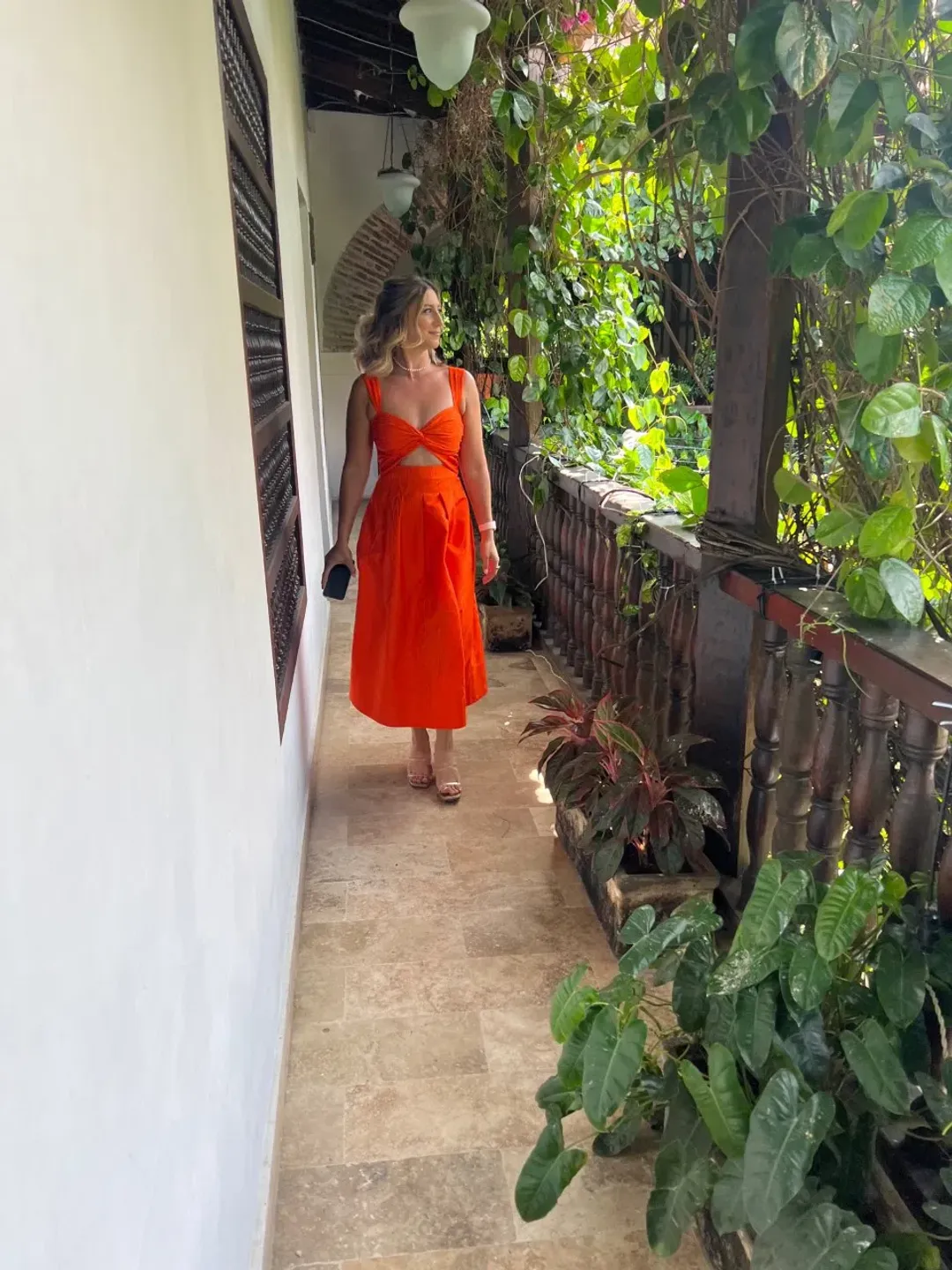 Rebecca Vallance Carmelita Cut Out Midi Dress Orange Size 10 for rent on The Volte - main image