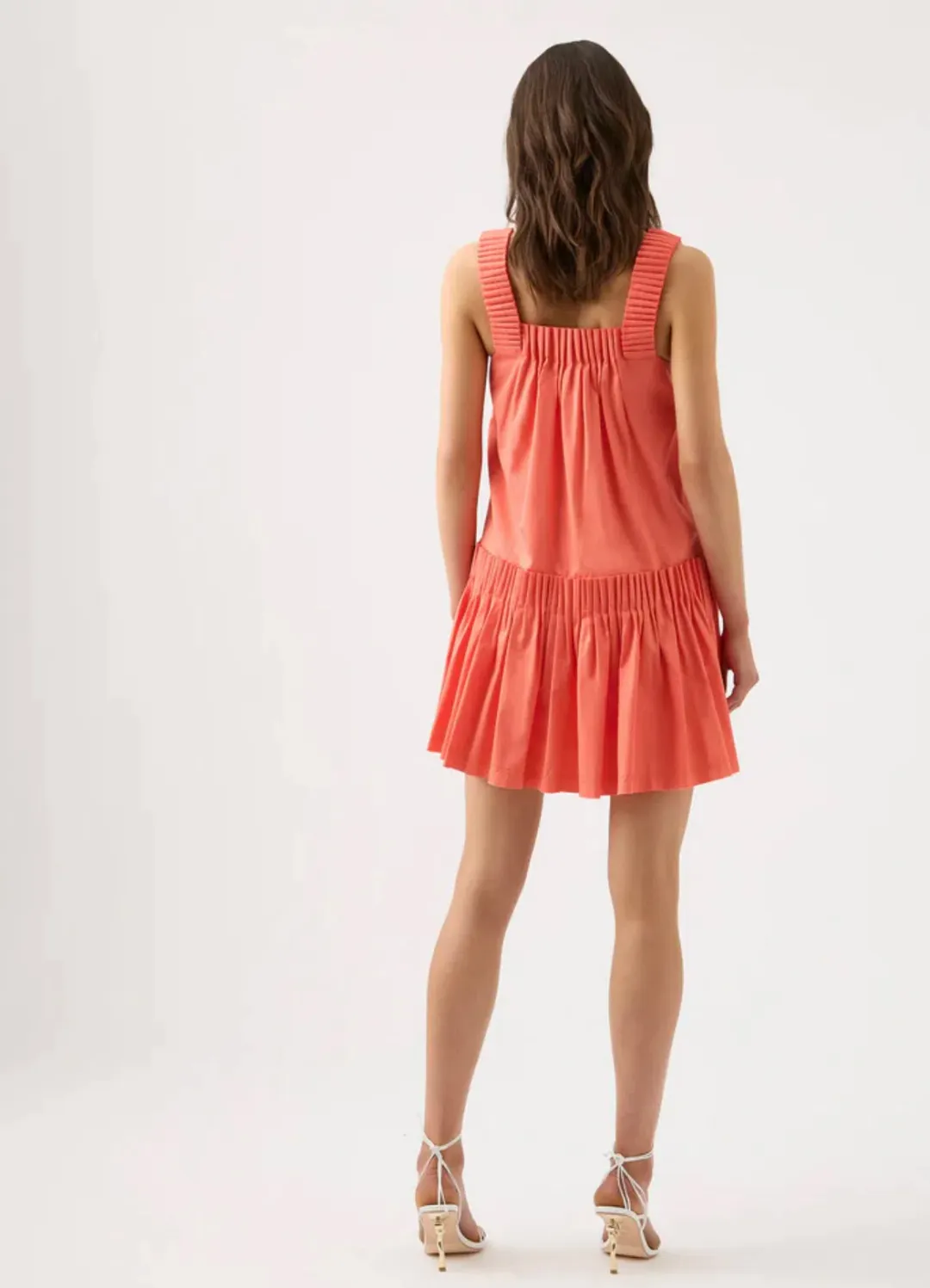 Aje Cecilia Smock Mini Dress in Coral Peach Size AU 14 for rent on The Volte - main image