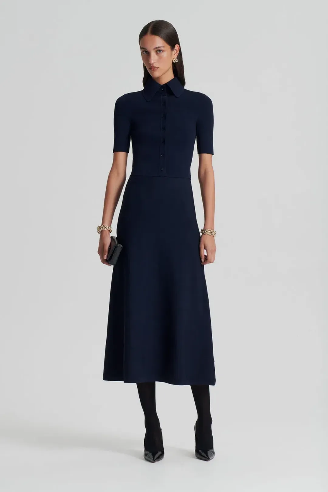 Scandal Theodore Crepe Knit Soft Skirt Navy Size M/AU 10 for rent on The Volte - main image