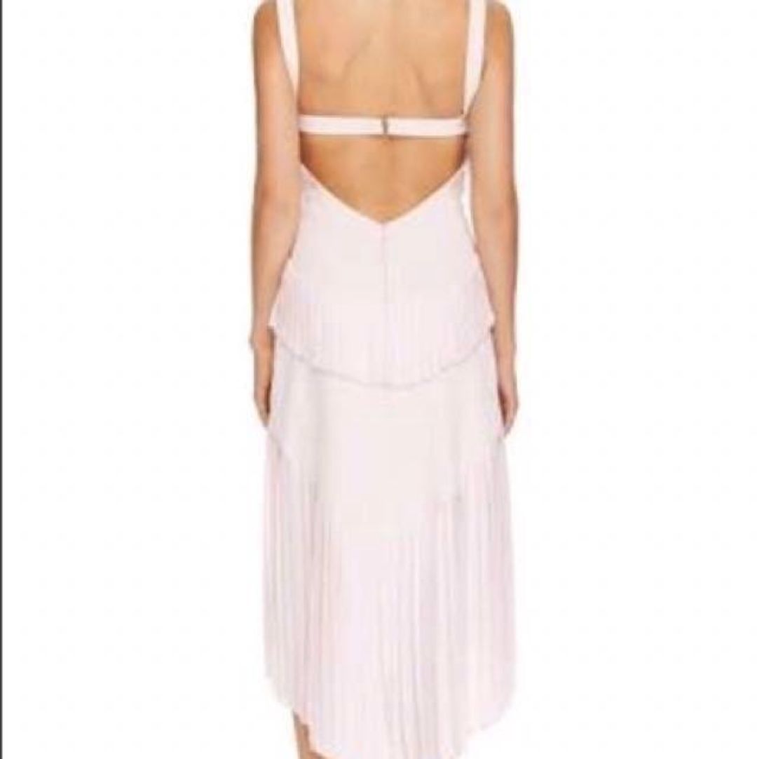 DION LEE - "Broken Pinafore" Dress in Black with Pink strap (back) for rent on The Volte - main image