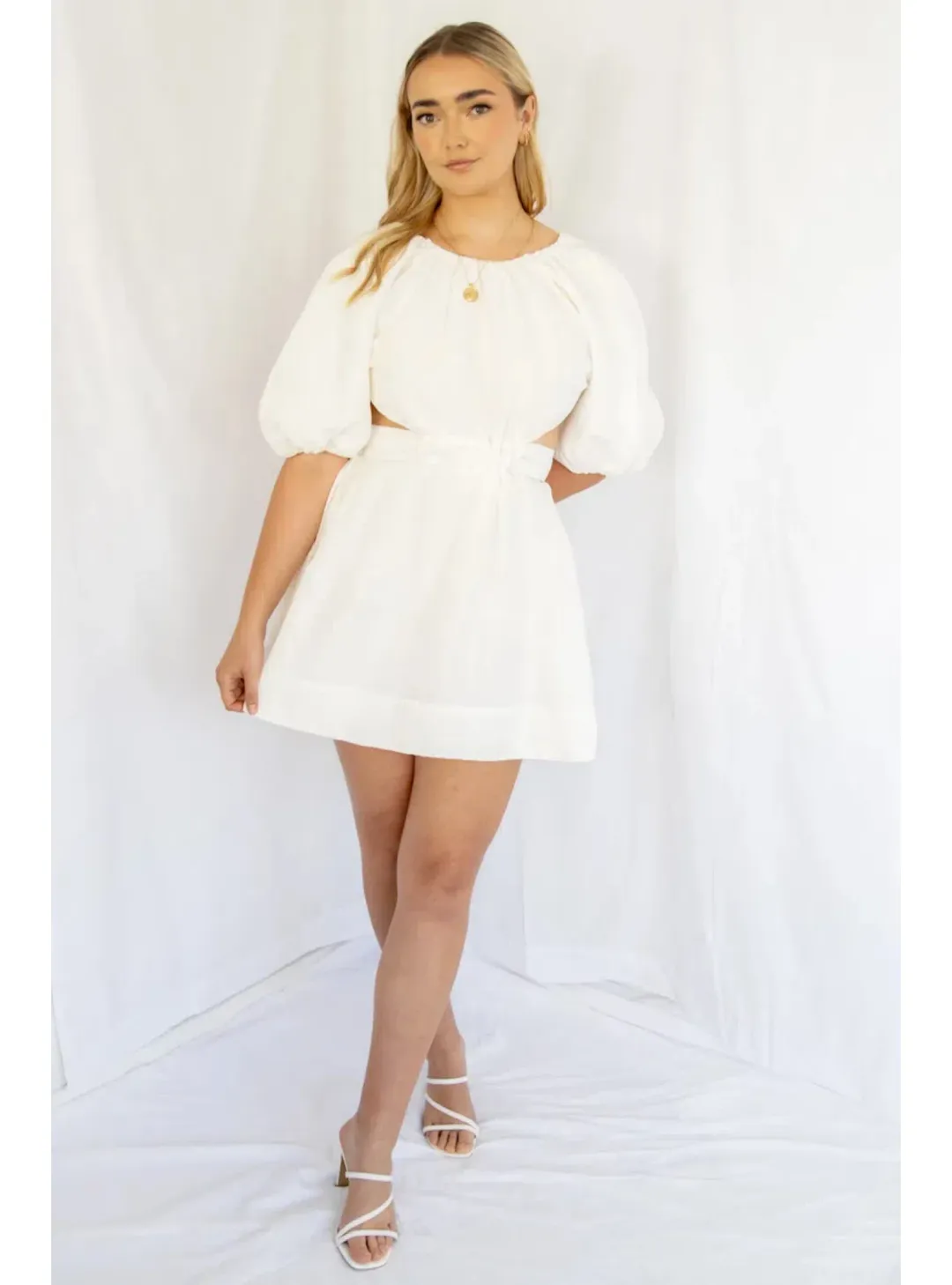 Aje Mimosa Cut Out Mini Dress in Ivory Size AU 6 for rent on The Volte - main image