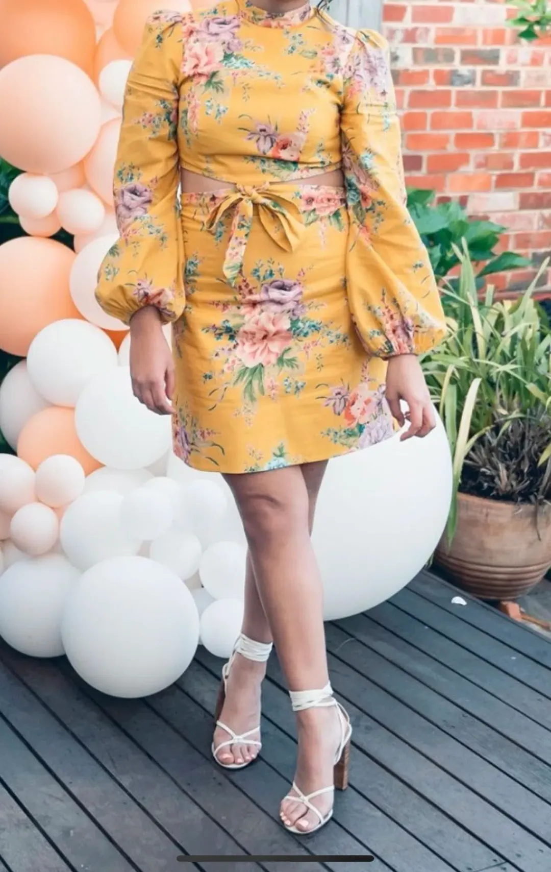 Zimmermann Zinnia Bow Cut Out Short Dress Golden Floral Size 1 / AU 10 for rent on The Volte - main image