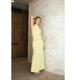 With Harper Lu Textured Halter Top and Maxi Skirt in Limoncello Set Size XS / AU 6 for rent on The Volte - image 5