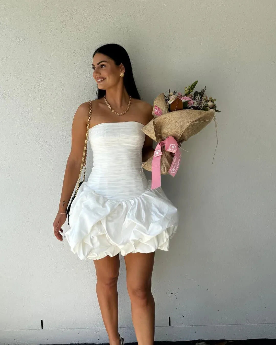 Aje Violette Bubble Hem Mini Dress in Ivory Size AU 10 for rent on The Volte - main image