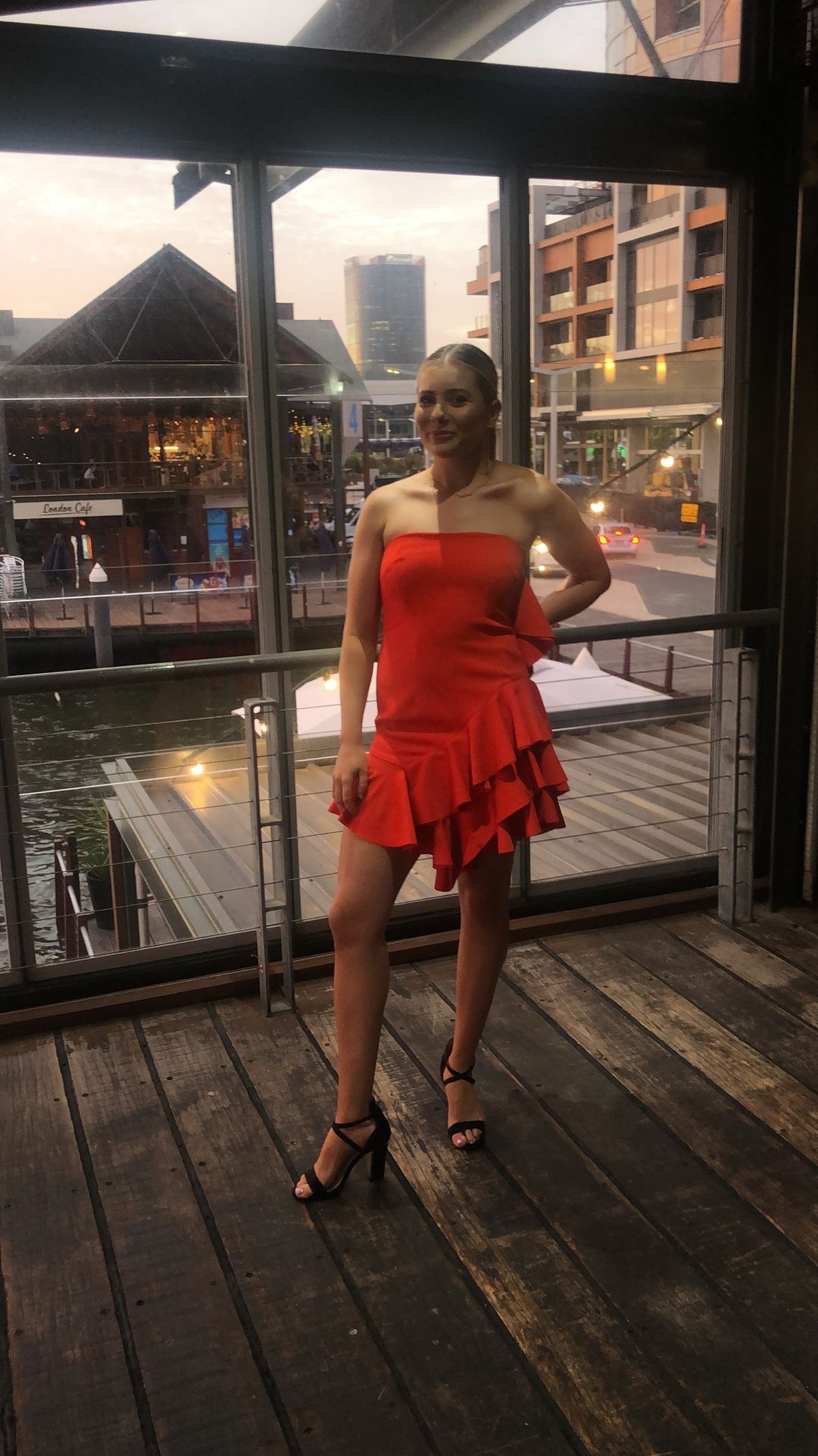 By Johnny Lily Strapless Flounce Mini Dress in Scarlet Size 10 for rent on The Volte - main image