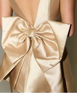 The Ultimate Muse Bow Detail Mini Dress Gold Size 10 for rent on The Volte - image 3