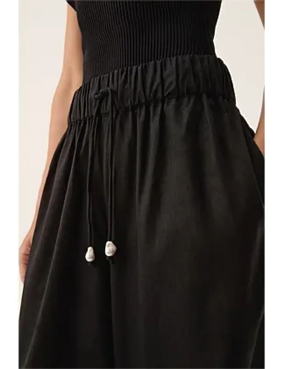 Aje Airlie Relaxed Pants in Black Size AU 8 for rent on The Volte - main image