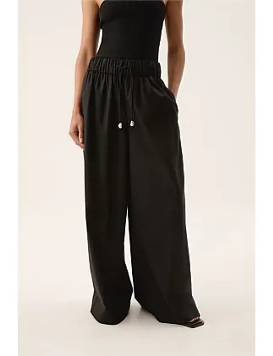Aje Airlie Relaxed Pants in Black Size AU 8 for rent on The Volte - main image