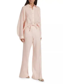 Zimmermann Crush Linen Flare Pant in Pink Size 1 / AU 10 for rent on The Volte - image 1